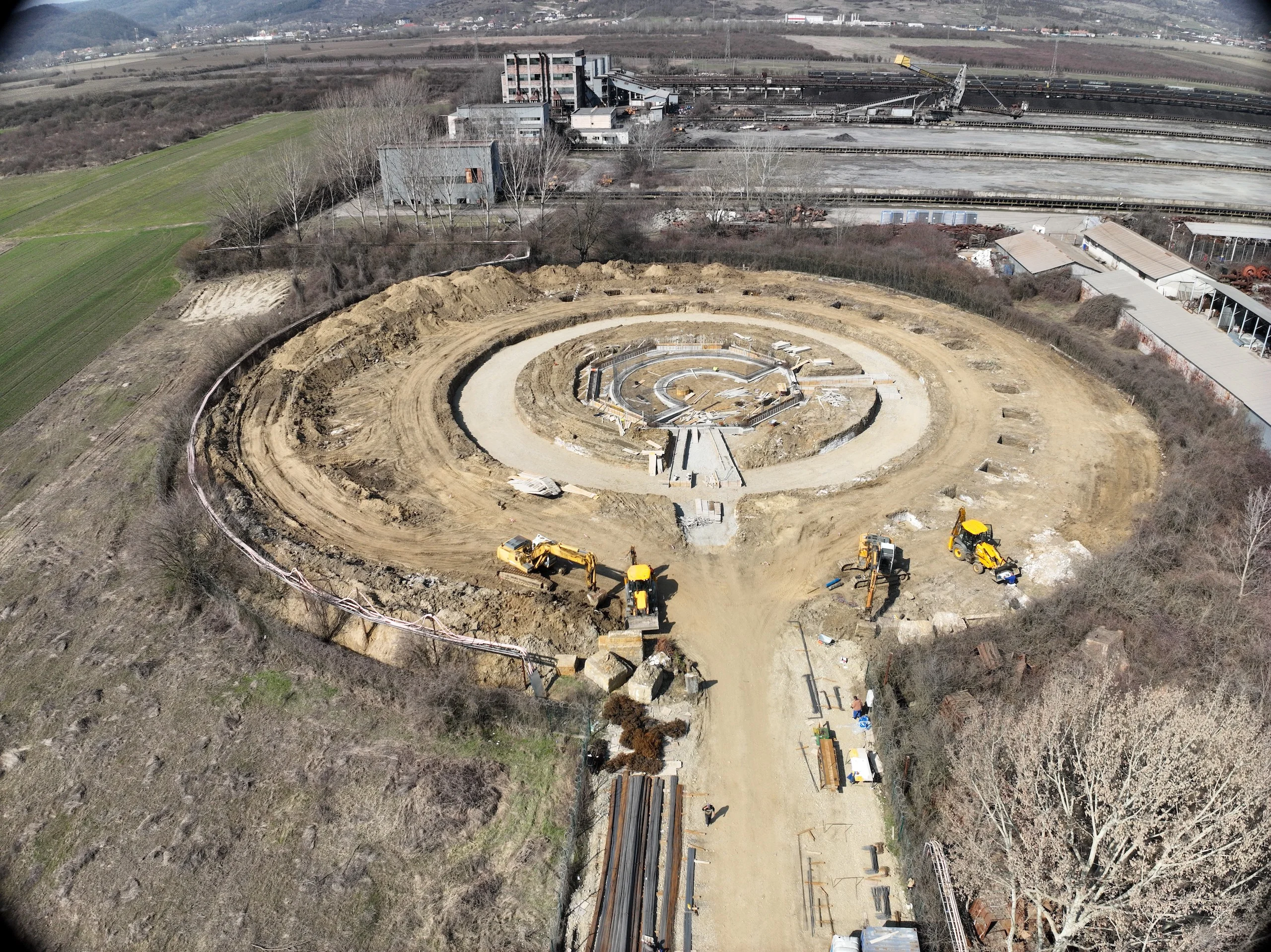 Aerial view of Building A - foundation works with circular trenches