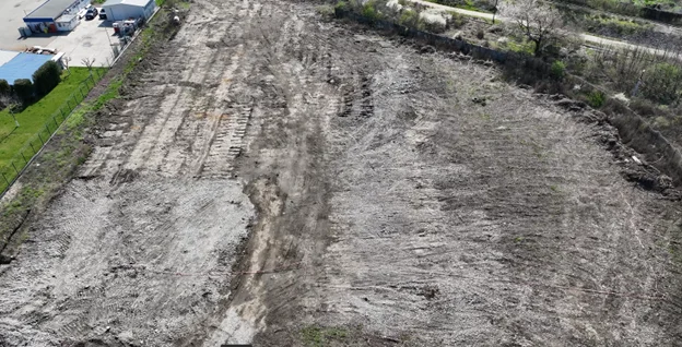 Aerial view of Building B construction site - land prepared for construction